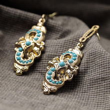 女人饰界 探索欧美时尚饰品的新浪潮——合金复古派对耳环与配饰的批发与直销